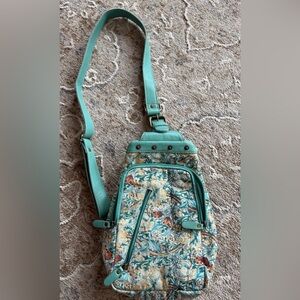 Myra Bag Turquoise and Floral Sling bag.